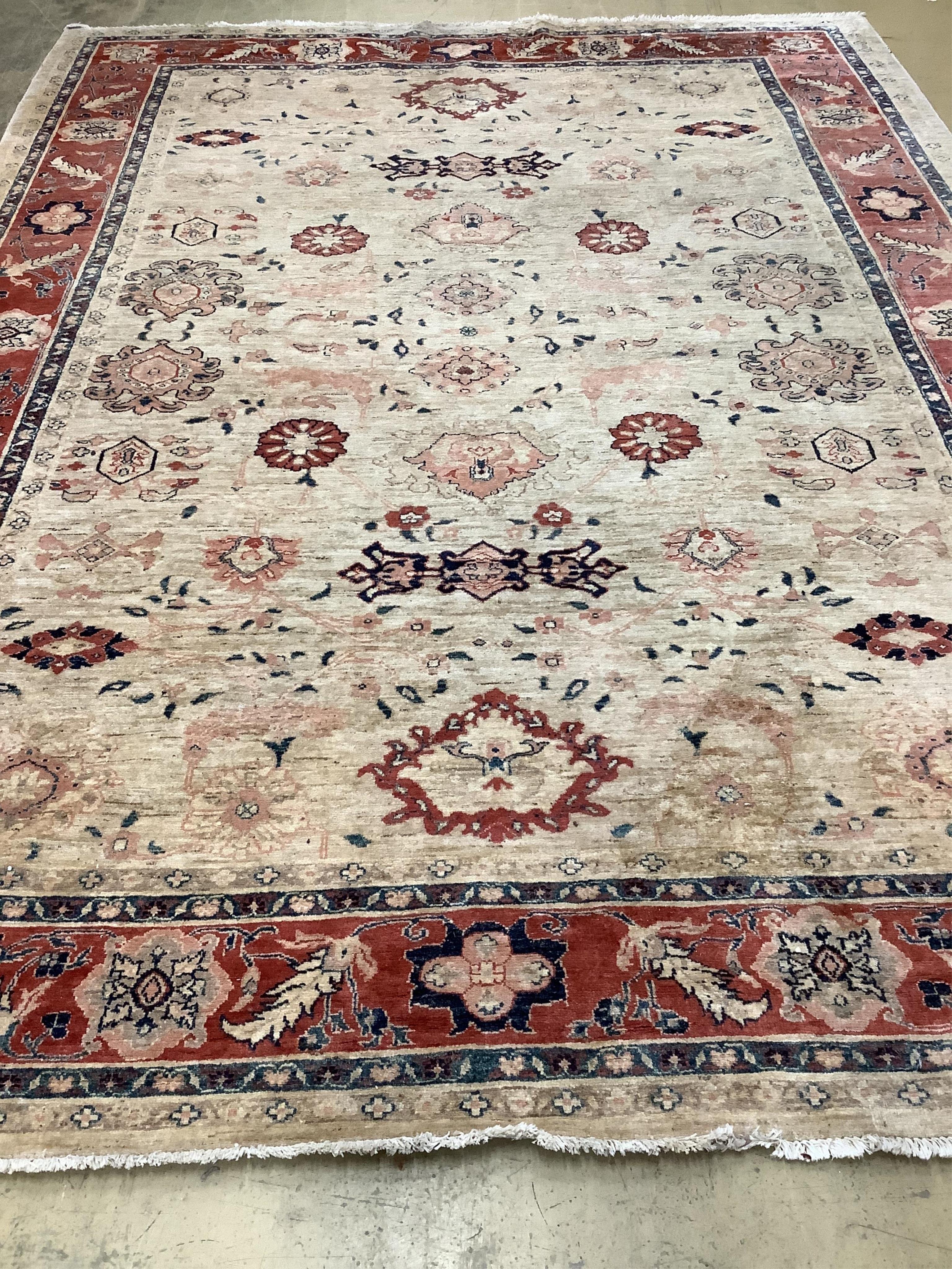 A Zeigler style ivory ground carpet 360cm x 273cm. Condition - good.